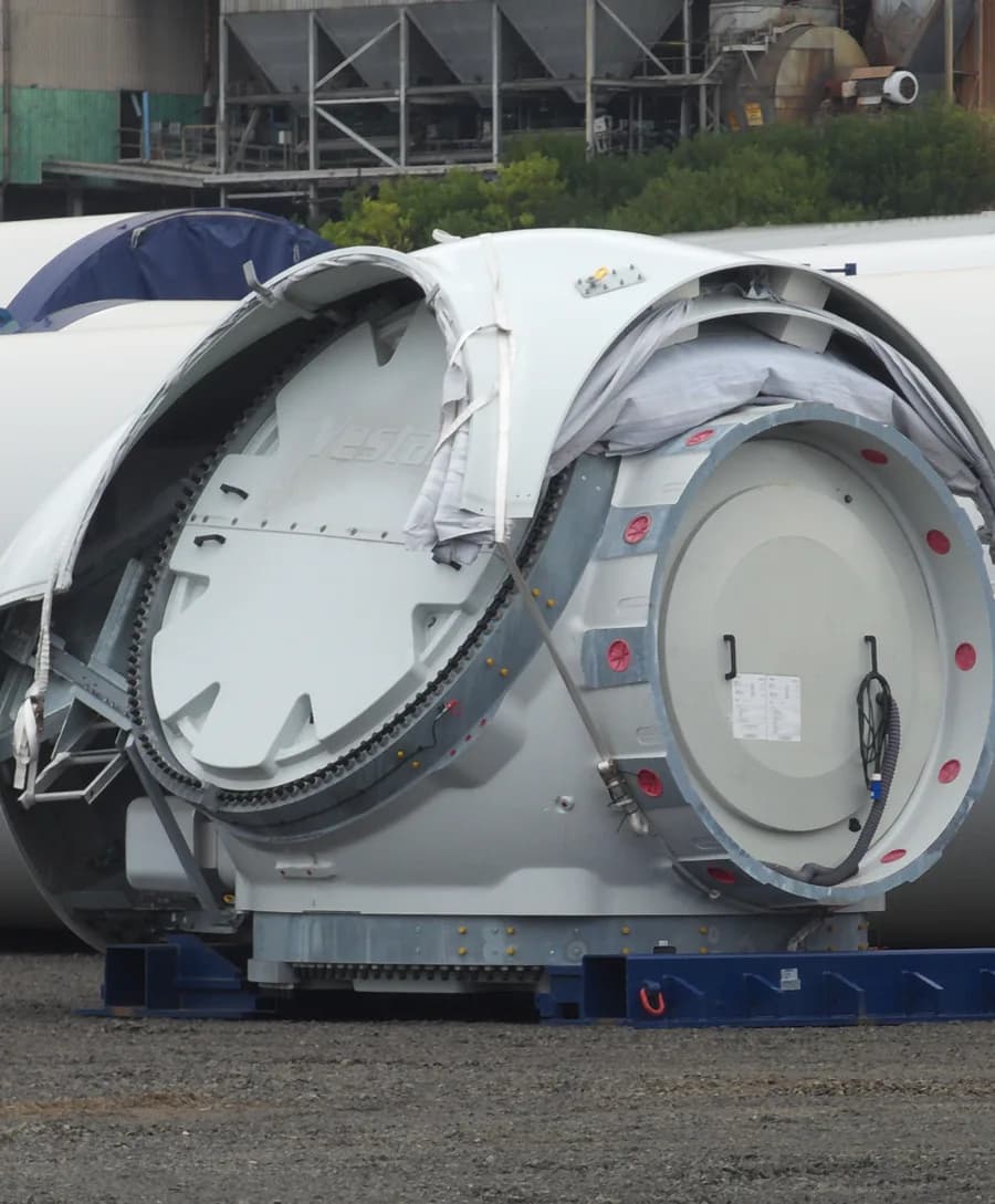 A wind turbine hub and nacelle on its transport frame